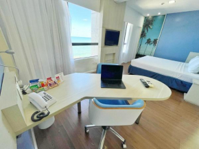 Mercure 1404 · Suíte moderna com vista p/ o mar